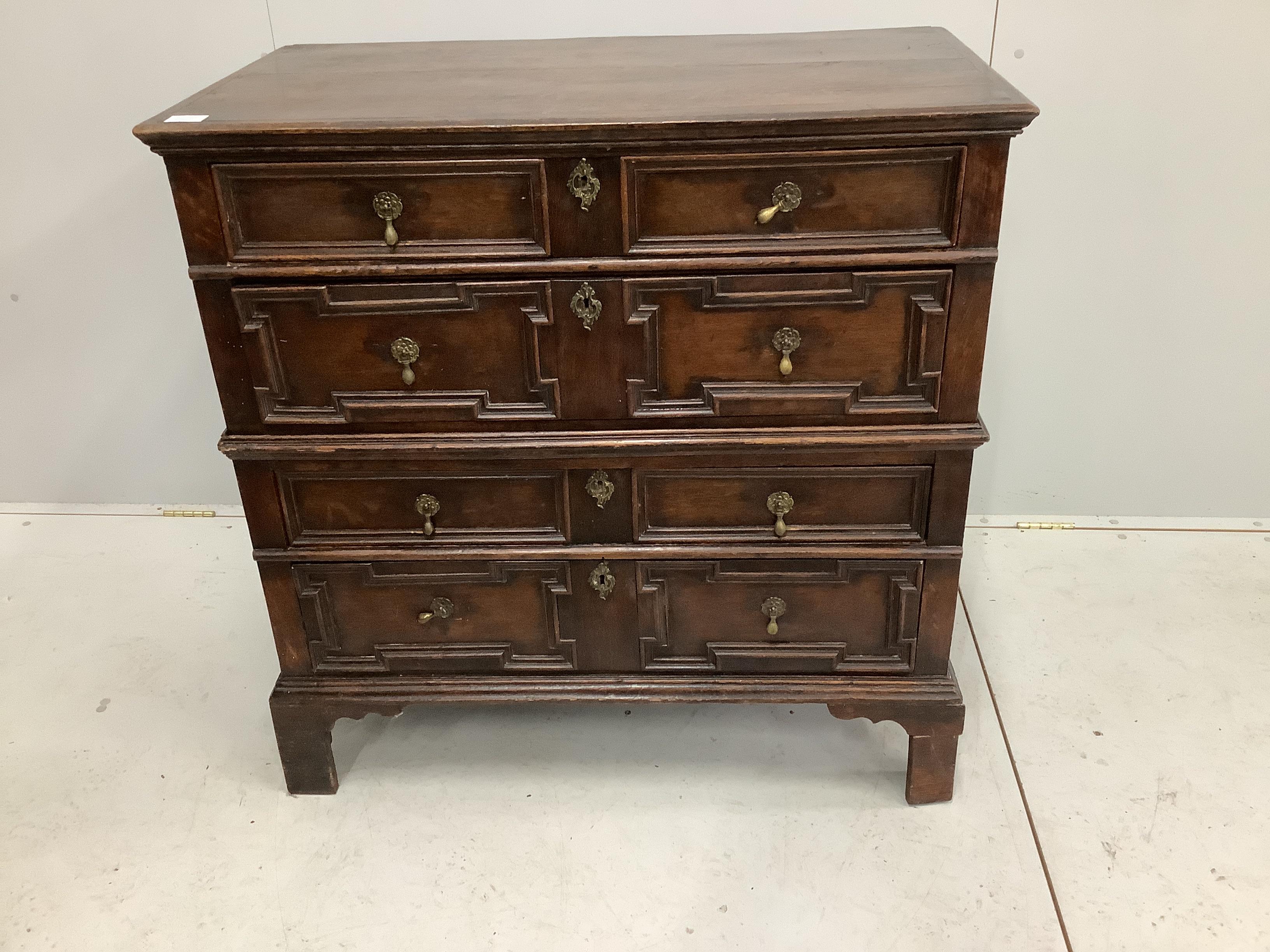 An early 18th century and later oak two part chest, width 96cm, depth 53cm, height 97cm